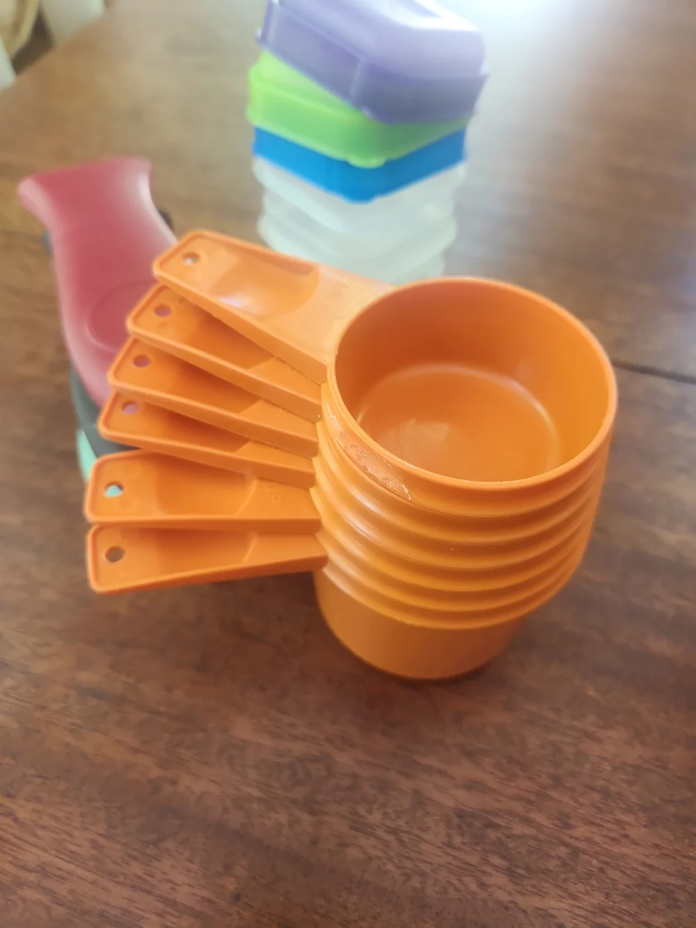 TupperwareOrange Plastic Measuring Cups Plus Other Helpful Kitchen Items